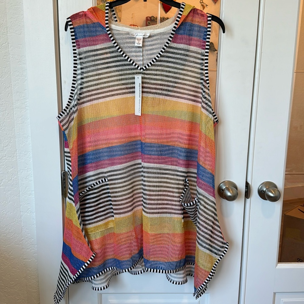 Nouveaumonde transparent top with pockets and a hood! Perfect for summer!